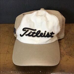 Hat tan and white golf cap used